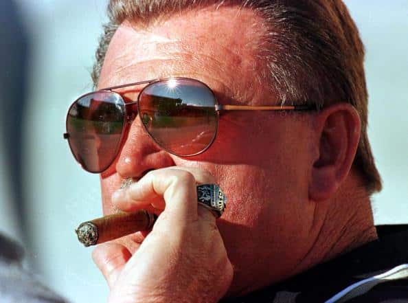 Dick Butkus smoking a cigar