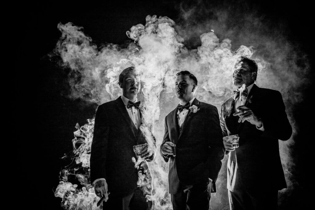 Smoking cigars at a wedding